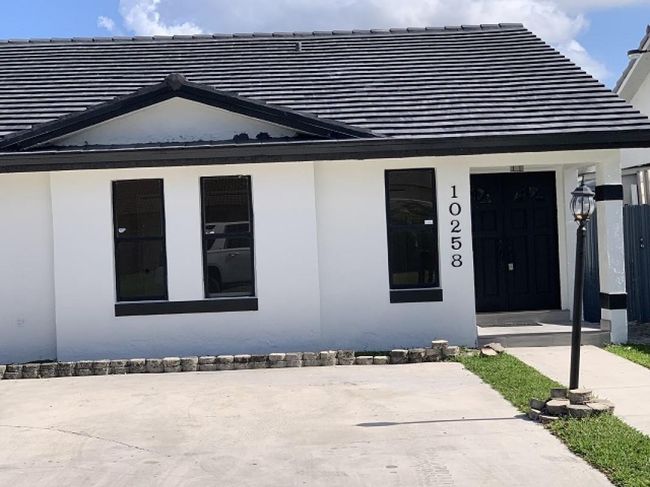 10258 Nw 129th St, House other with 3 bedrooms, 2 bathrooms and null parking in Hialeah FL | Image 2