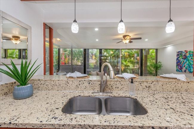 Kitchen overlooking living area | Image 9