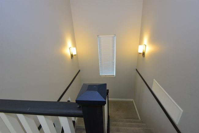 Staircase featuring carpet flooring and baseboards | Image 28
