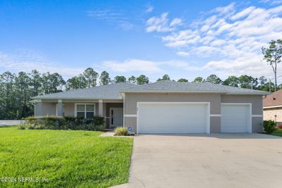 54 Riddle Drive, House other with 3 bedrooms, 2 bathrooms and null parking in Palm Coast FL | Image 2