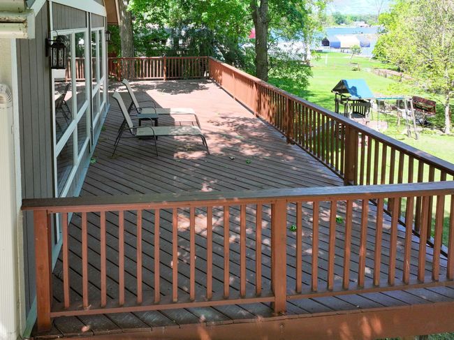 Large deck overlooking lake | Image 50