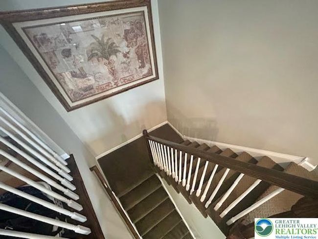 Stairs to loft and second floor bedroom and full bath | Image 23