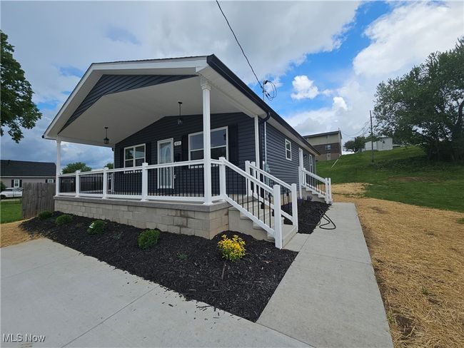 Landscaped with freshly seed yard. | Image 4