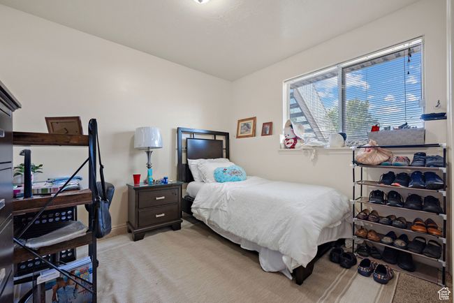 Bedroom with light colored carpet | Image 53
