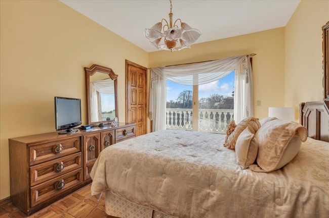 Bedroom featuring access to outside | Image 18