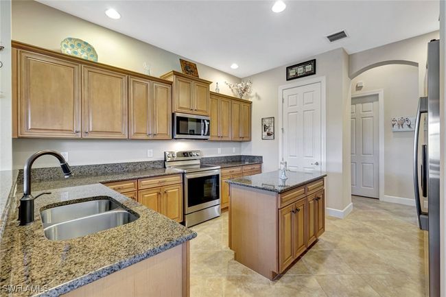9693 Cobalt Cove Cir, House other with 3 bedrooms, 3 bathrooms and null parking in NAPLES FL | Image 11