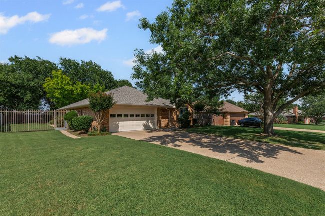 Discover this beautifully maintained 3-bedroom, 2-bath residence nestled in the highly sought after Winchester Addition with new roof and new gutters. | Image 24