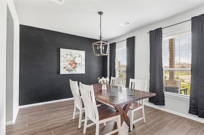 Spacious dining room in front of home | Image 7