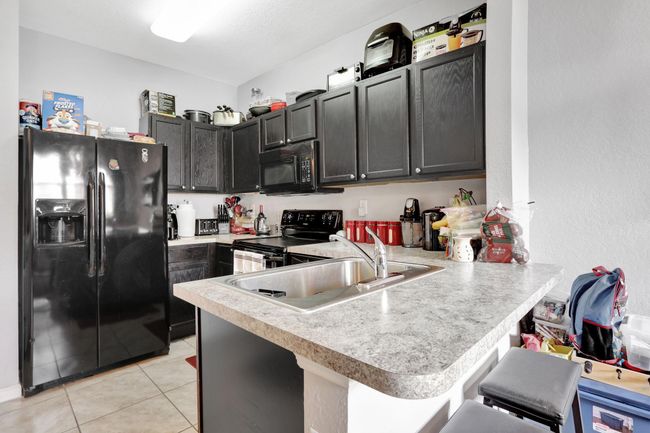 3513 Nw 29 Th Ct, Townhouse with 2 bedrooms, 3 bathrooms and null parking in Lauderdale Lakes FL | Image 12