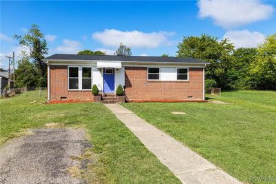 View of front of home with a front yard | Image 1