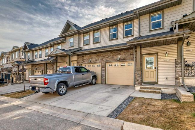 83 Panatella Hill Nw, Home with 3 bedrooms, 2 bathrooms and 2 parking in Calgary AB | Image 1