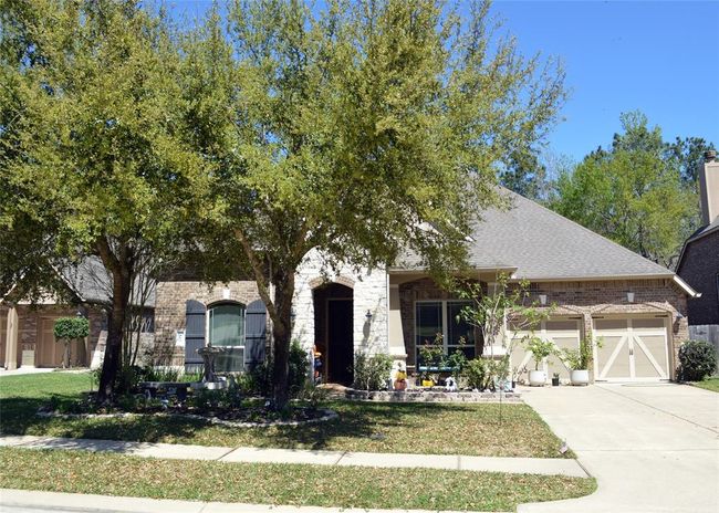 409 Holly Forest Dr, House other with 5 bedrooms, 4 bathrooms and 3 parking in Conroe TX | Image 19