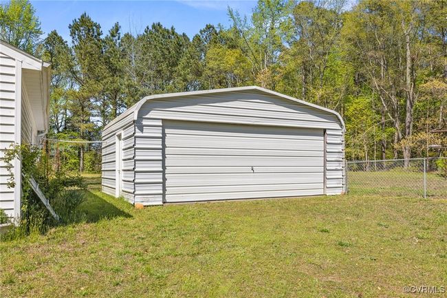 Garage featuring fence | Image 28
