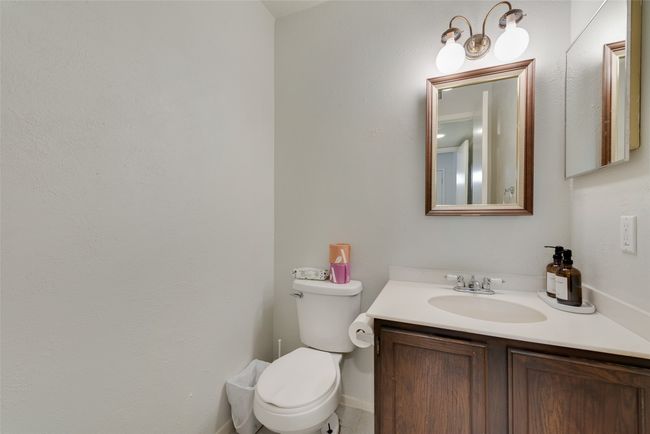 Bathroom with vanity and toilet | Image 10