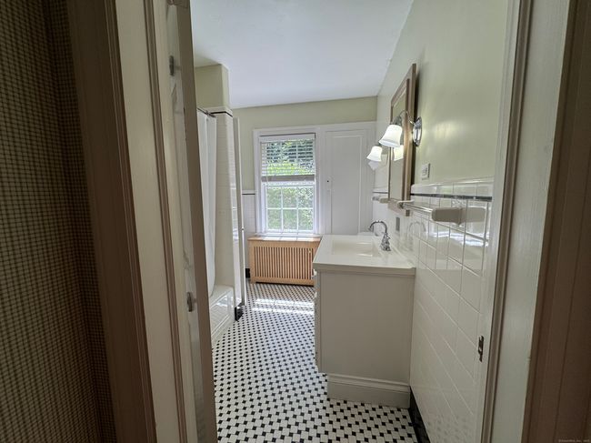 Main level full bathroom. | Image 12