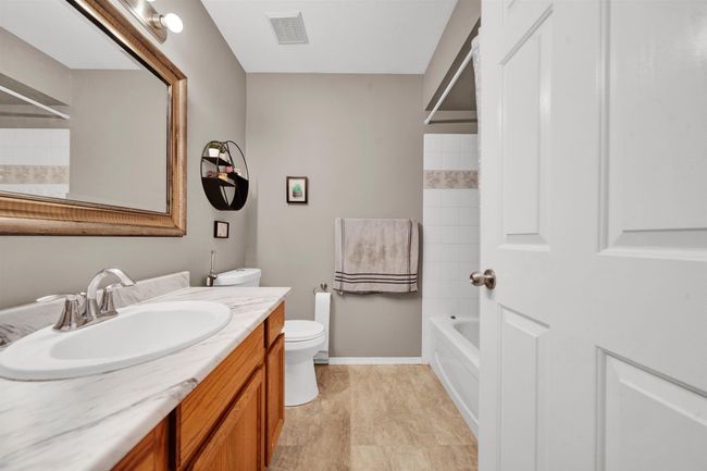 Carpeted bedroom featuring a closet and baseboards | Image 33