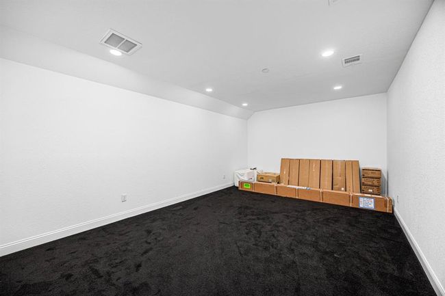 Attic recently converted to Media Room. | Image 37