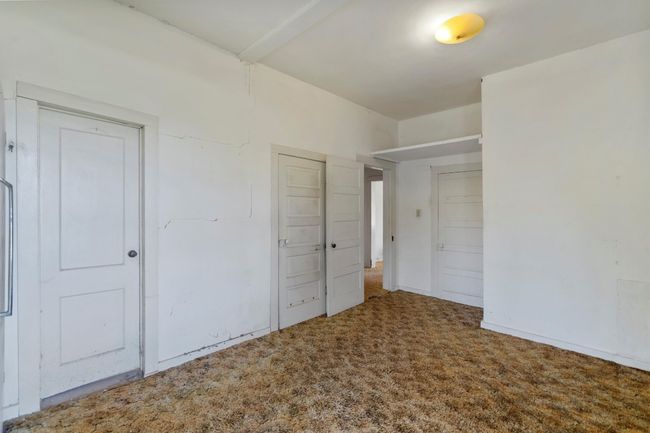 Unfurnished bedroom with carpet | Image 20