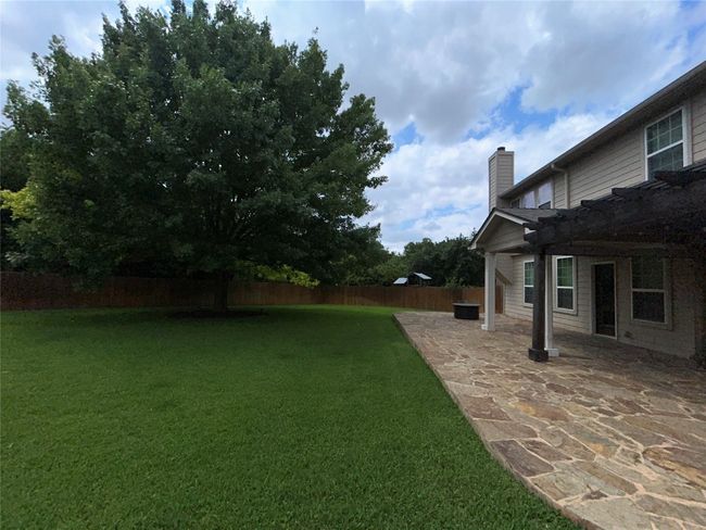 View of yard with a patio | Image 29
