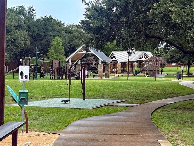 The home is a brisk short walk from the well kept quiet community park. | Image 33