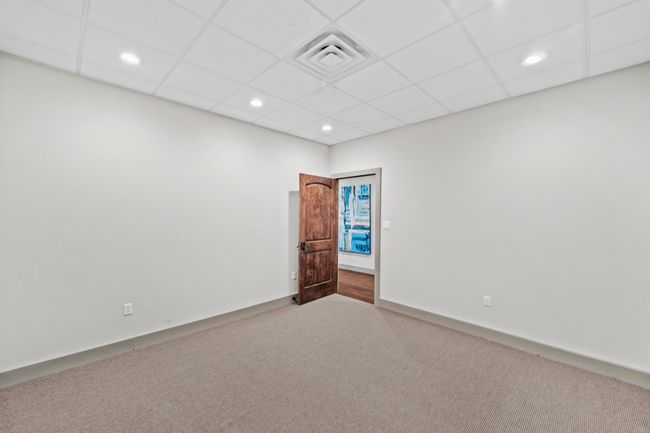 Upstairs commercial space with rich wood floors, front access via an electric stair chair lift | Image 7