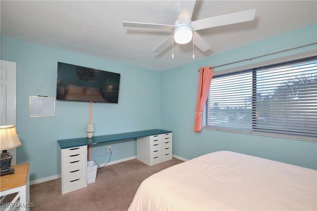 Carpeted bedroom featuring baseboards and a ceiling fan | Image 27