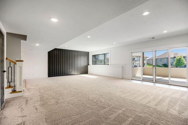 Spare room with carpet, recessed lighting, stairs, and baseboards | Image 30