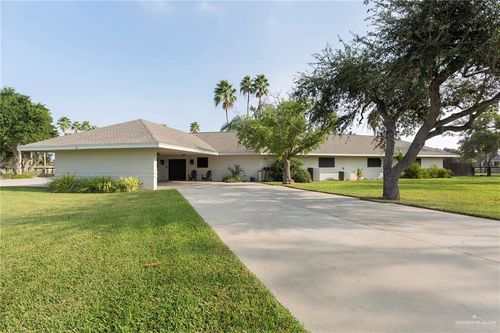 1061 Lion Lake Dr S, Weslaco, TX, 78596-9648 | Card Image
