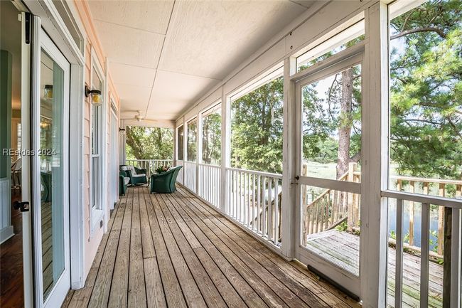Unfurnished sunroom with ceiling fan | Image 44