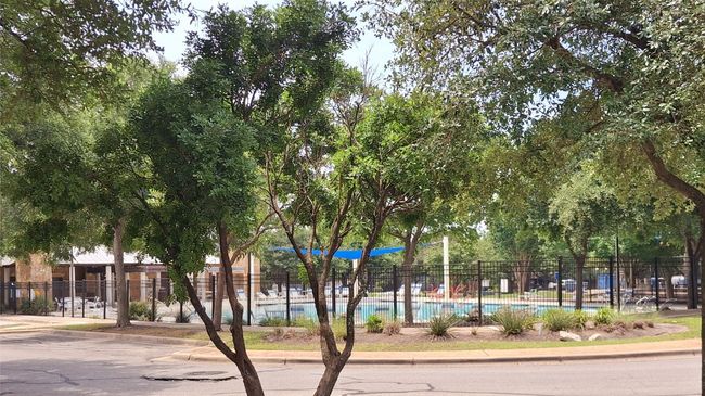 View of home's community 2nd playground and swimming pool | Image 21