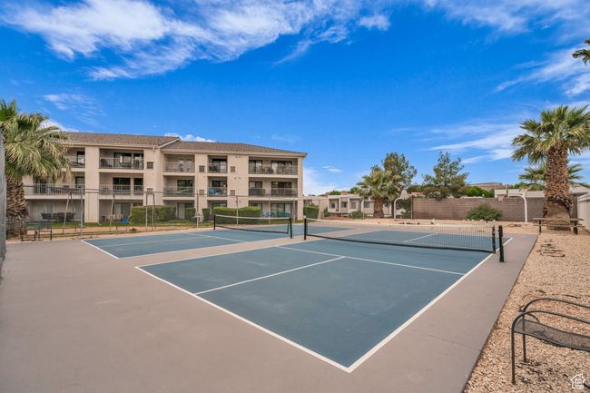 View of tennis court with community basketball court | Image 26