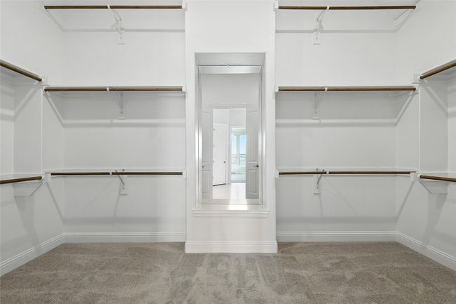 Spacious closet with carpet | Image 22