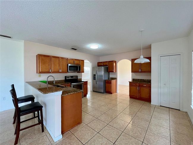 4445 Maple Chase Trl, House other with 4 bedrooms, 3 bathrooms and null parking in Kissimmee FL | Image 9
