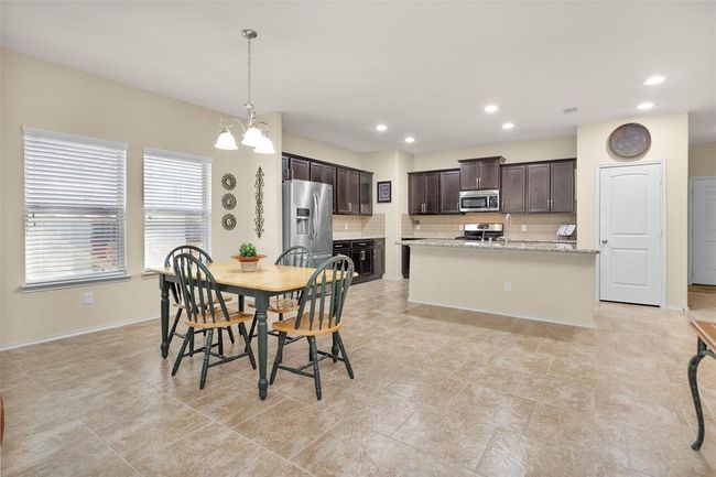 Breakfast room off kitchen. | Image 16