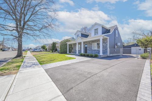 897 Merillon Ave, Westbury, NY, 11590-6112 | Card Image