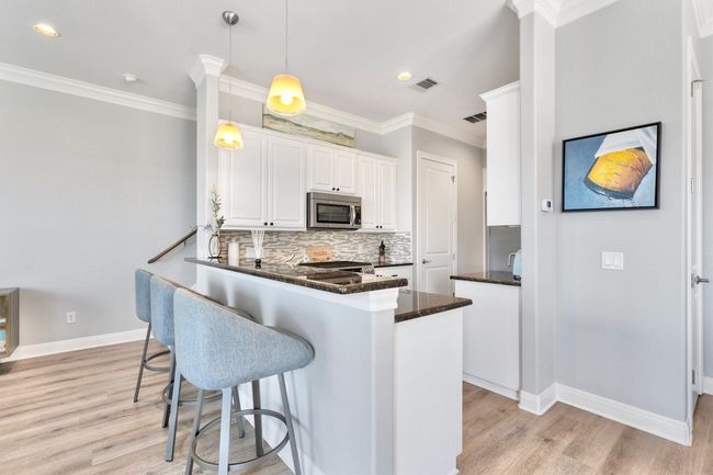 Bar counter overlooking the kitchen | Image 7