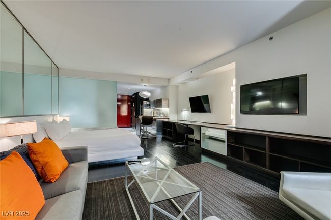 Bedroom with dark wood-style floors | Image 16