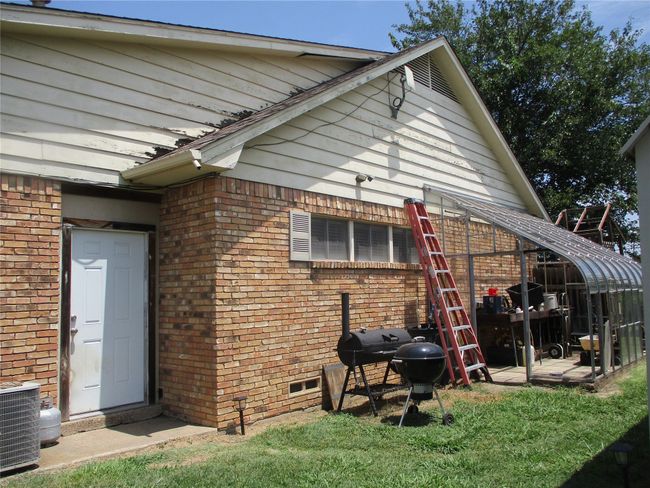 Rear view of house featuring cooling unit | Image 7