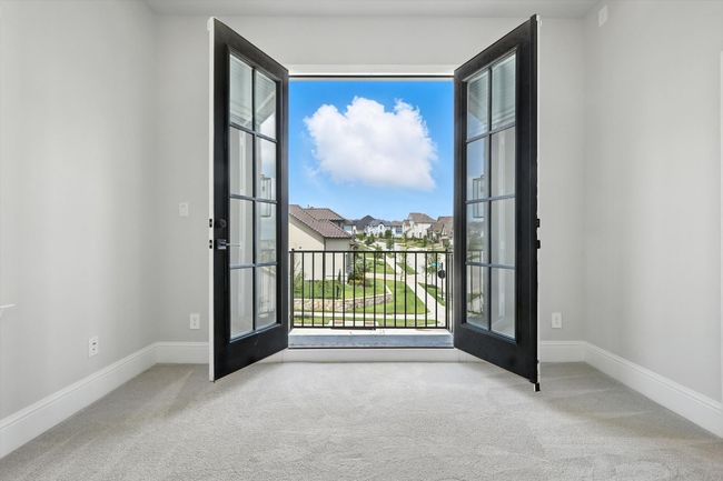 Doorway to outside featuring carpet floors | Image 34