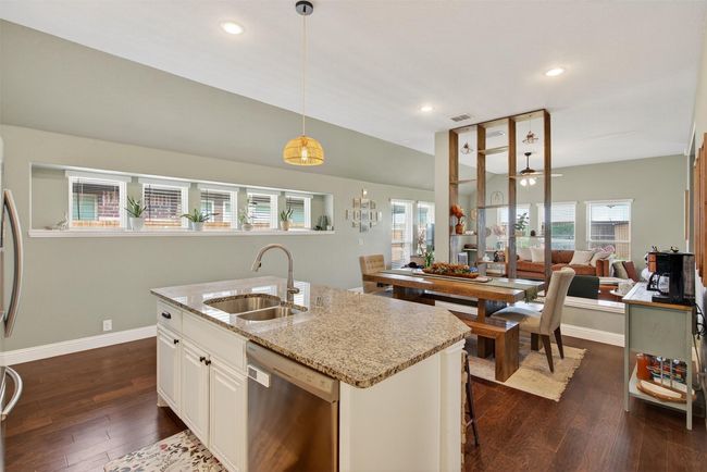 Kitchen with dishwasher, open floor plan, plenty of natural light, dark wood-style floors, and recessed lighting | Image 16