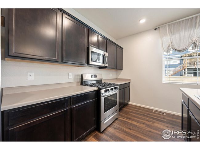 6793 Hayfield St, House other with 4 bedrooms, 3 bathrooms and null parking in Wellington CO | Image 9