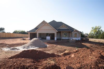 Craftsman-style home with a front lawn and a garage | Image 3