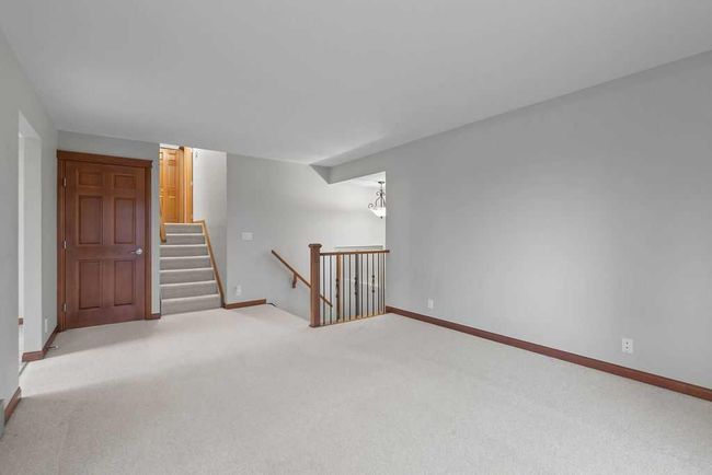 76 Coach Gate Way Sw, House other with 3 bedrooms, 2 bathrooms and 4 parking in Calgary AB | Image 10