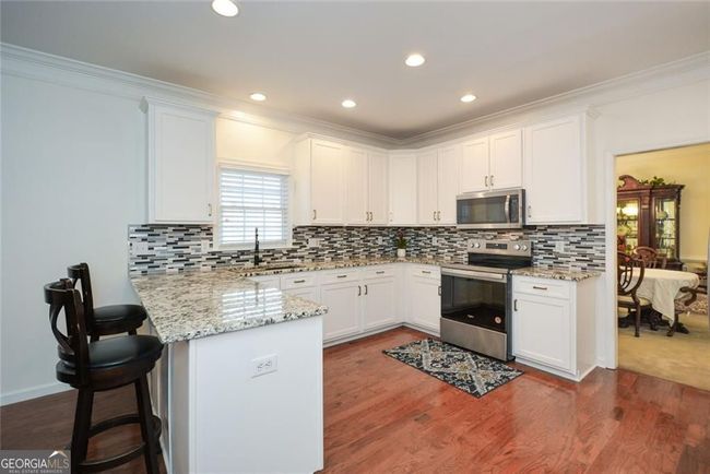 305 Collegiate Dr, House other with 5 bedrooms, 4 bathrooms and 2 parking in Powder Springs GA | Image 13