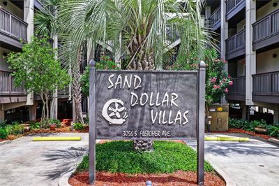 Sand Dollar Villas Sign. Unit 300 is a Top Floor End Unit | Image 1