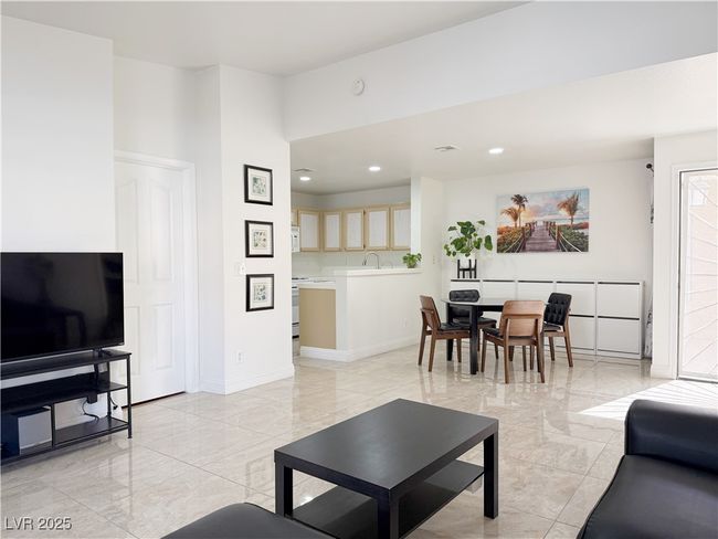 Living area featuring baseboards, marble finish floor, and recessed lighting | Image 7