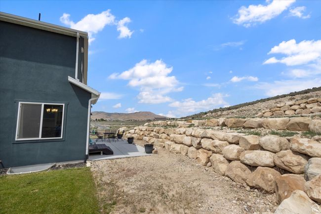 Terraced back yard with a patio and mountain view | Image 27