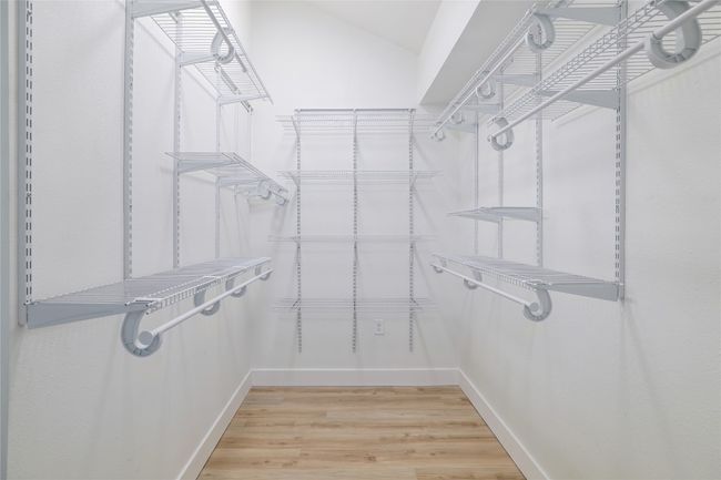 Walk-in closet in the primary creates endless storage opportunities. | Image 19