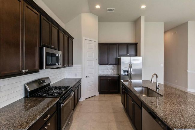 2304 Base Burner Path, House other with 3 bedrooms, 2 bathrooms and 2 parking in Leander TX | Image 12