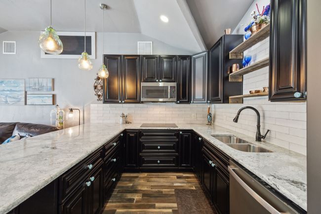 Secondary Kitchen with Rich Cabinetry, Granite Countertops, and Stainless Steel Appliances | Image 31